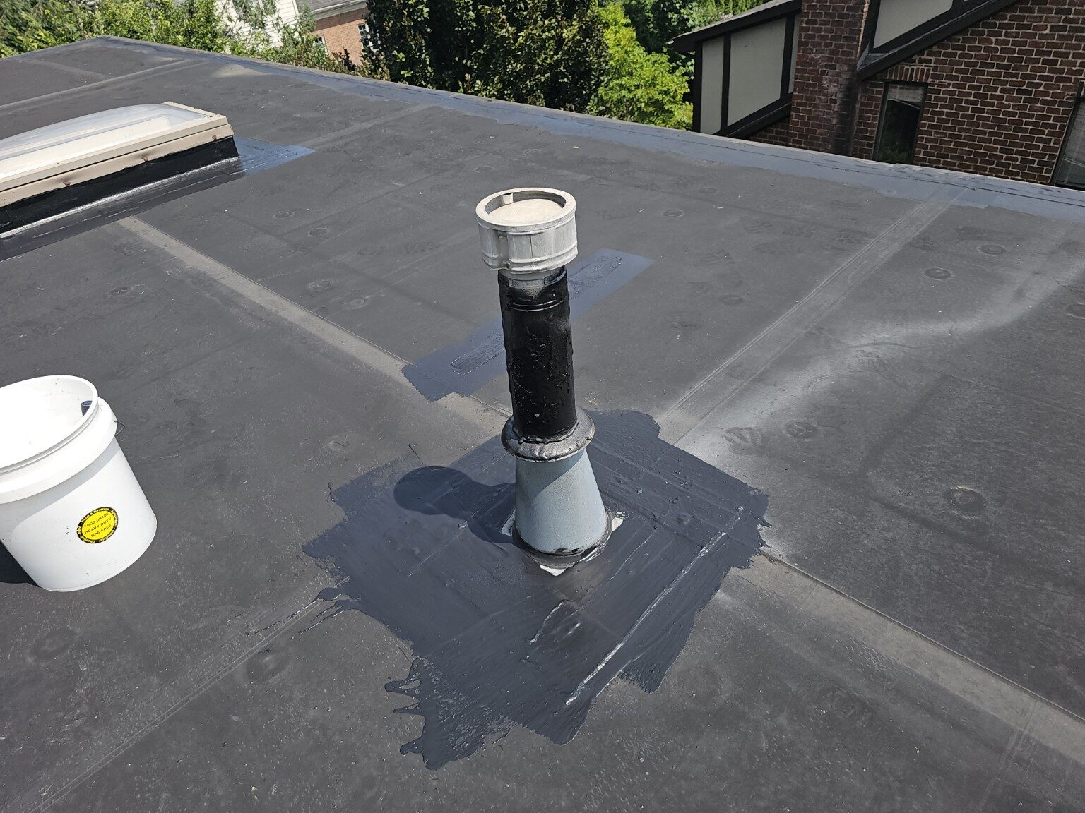 Detailed flashing around a completed roof penetration