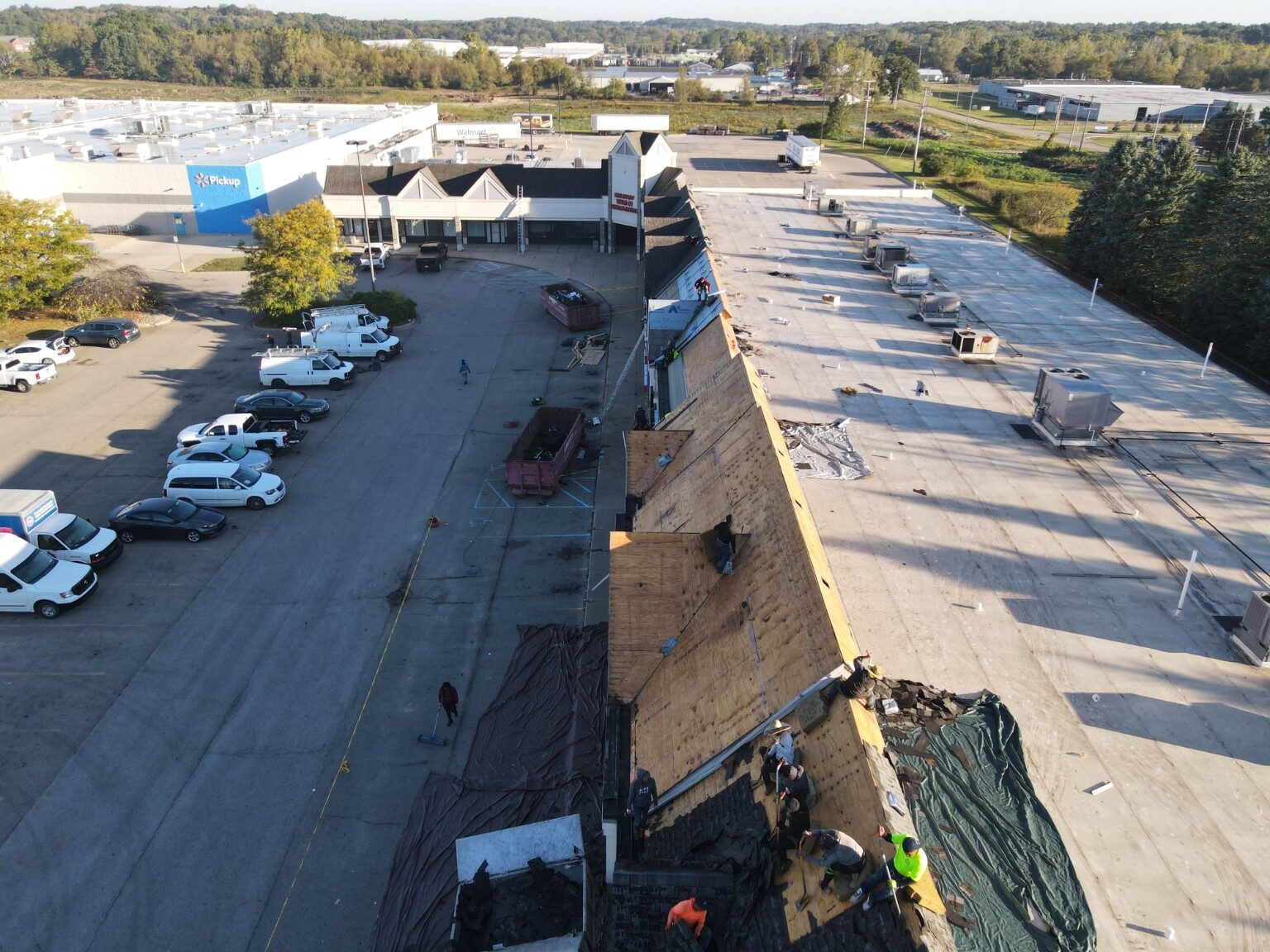 Large commercial roofing project viewed from above