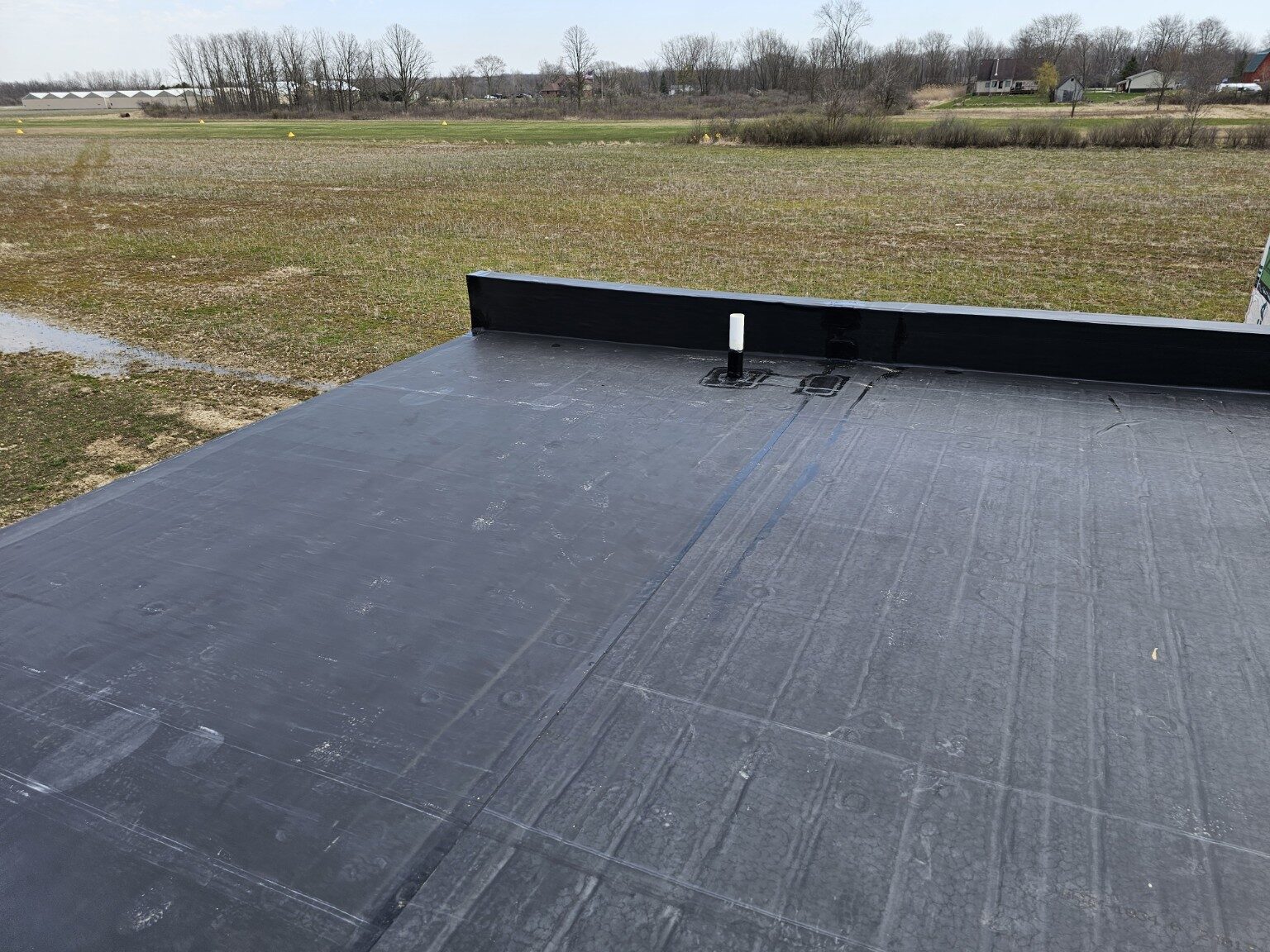 Finished EPDM membrane across a low-slope roof