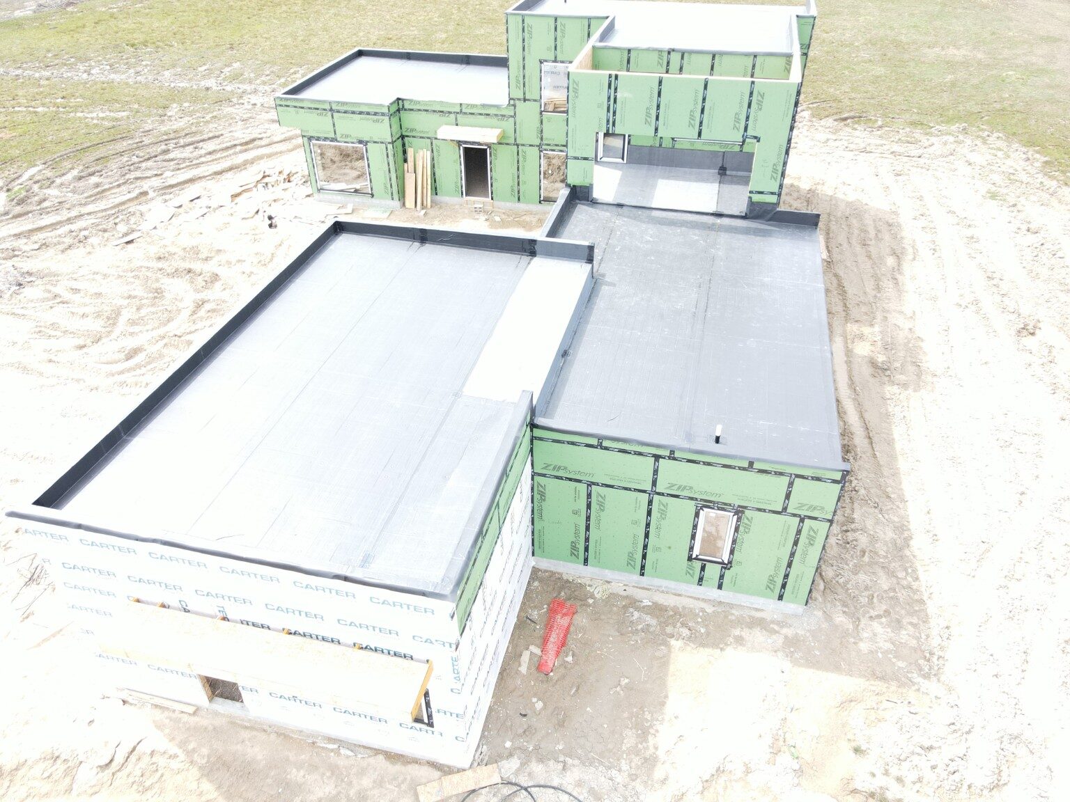 Aerial view of a multi-level EPDM roof installation