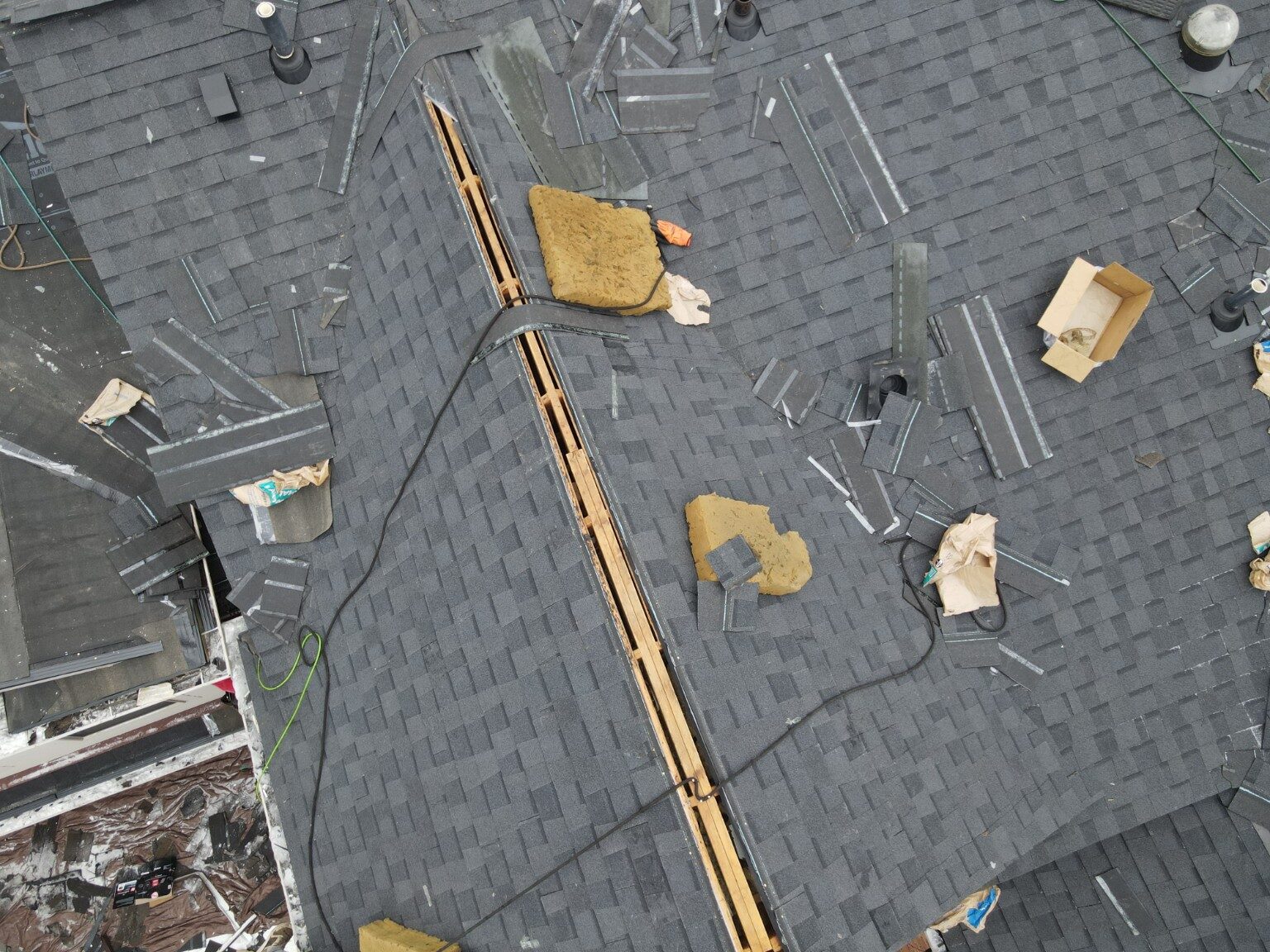 Architectural shingles installed around roof valleys and ridges