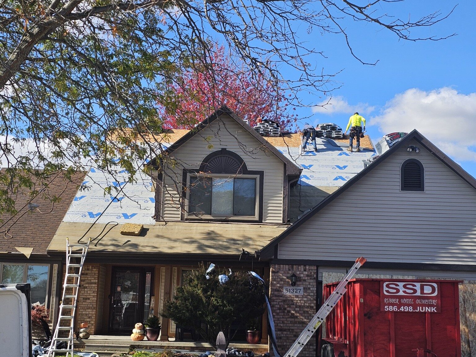 Top Notch Roofing crew installing a residential roof