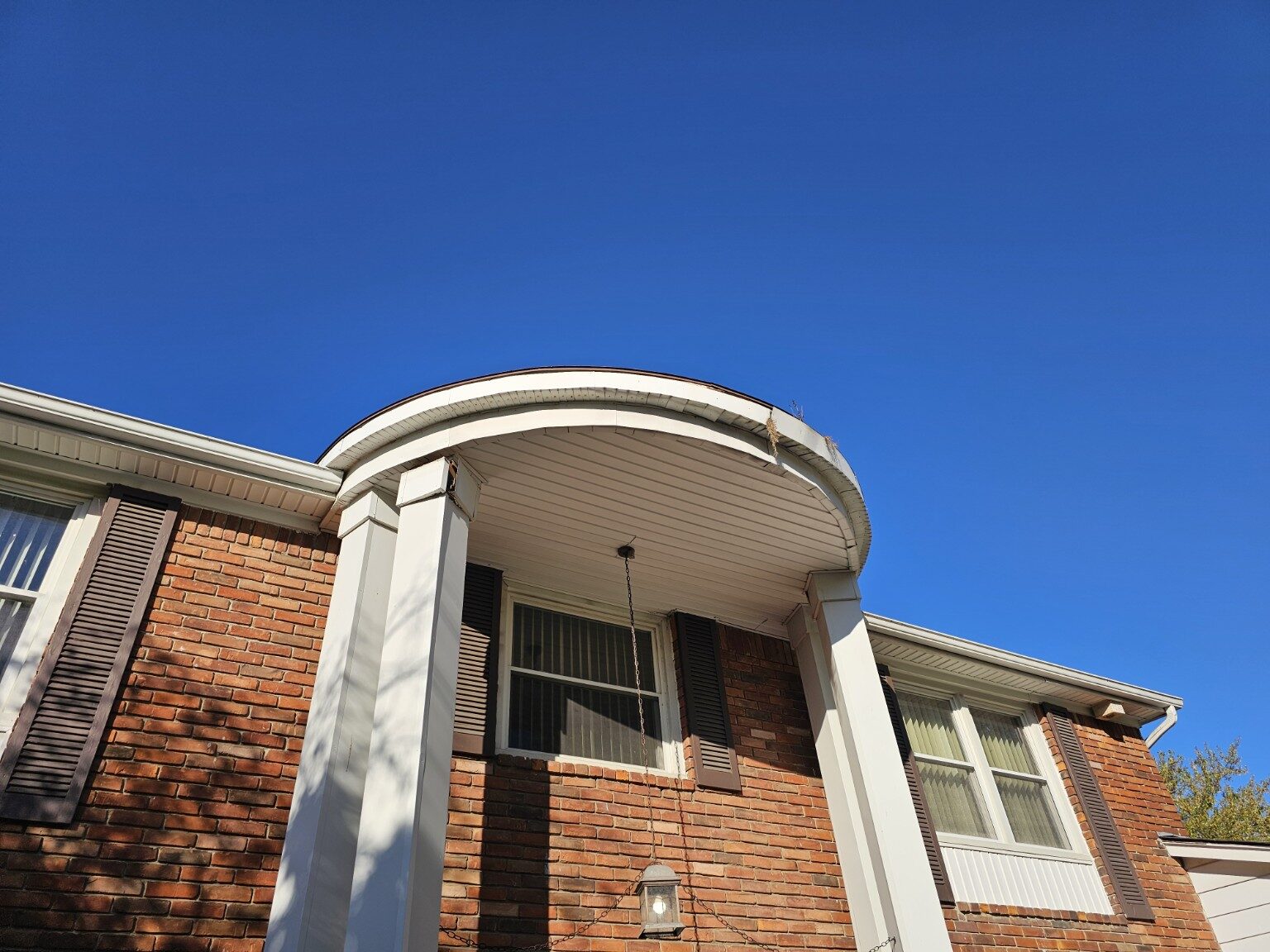 Finished exterior trim work on a brick home